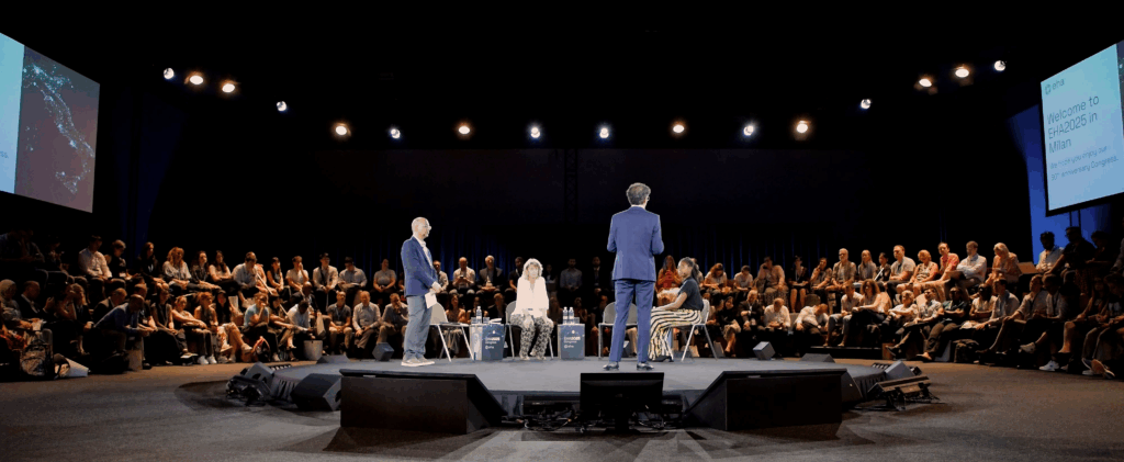 Presenters on stage during an EHA2025 session.